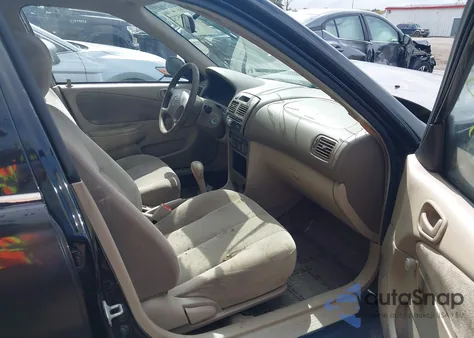 2001 Toyota Corolla Ce from USA, damaged, VIN 2T1BR12E21C388319